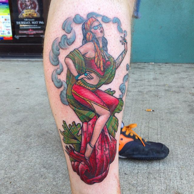 Gypsy lady pinup on calf. 