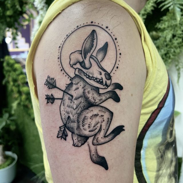 bones, dead rabbit, arrow tattoo